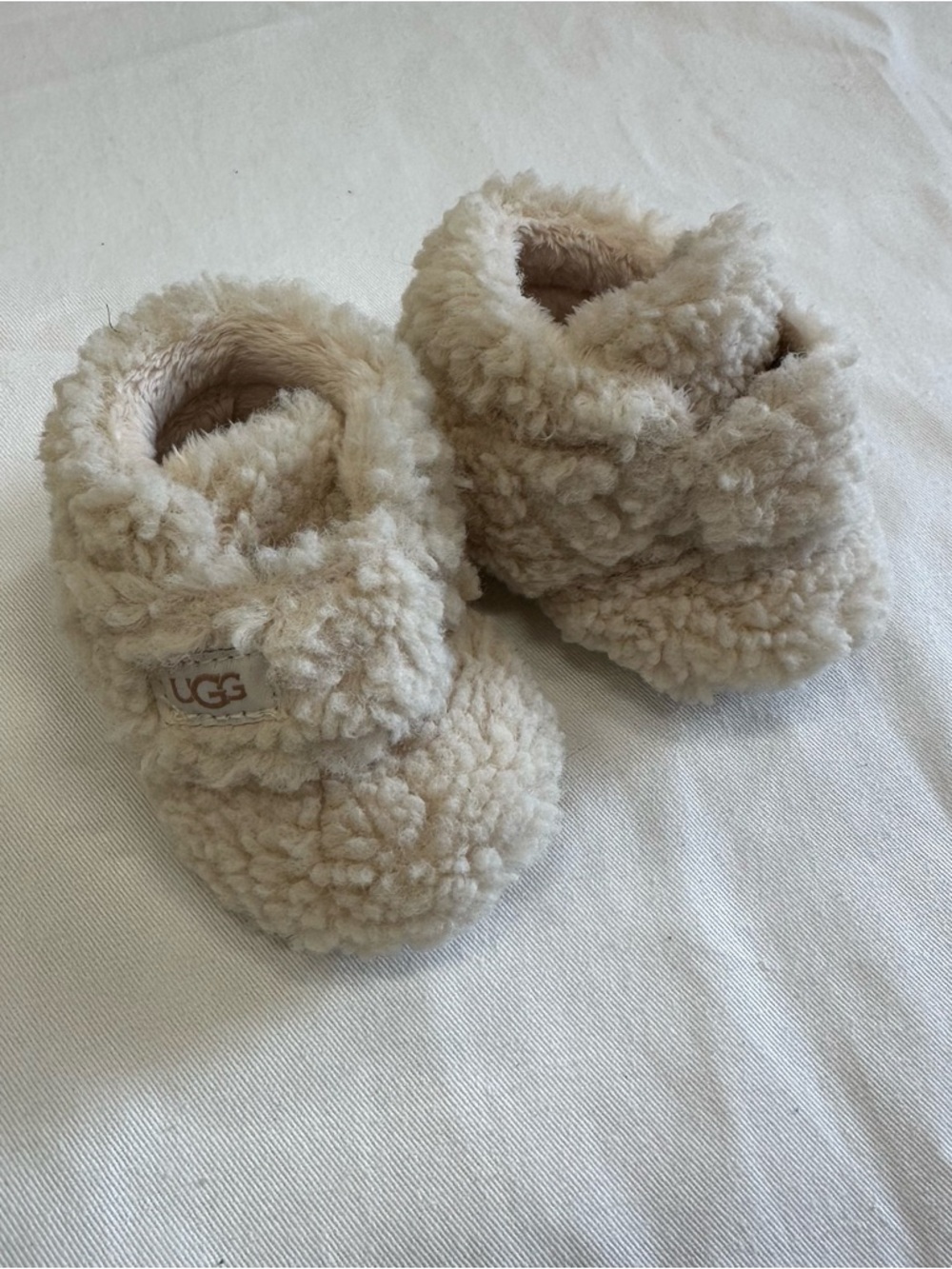 UGG Infant Plush Shearling Slippers in Sand